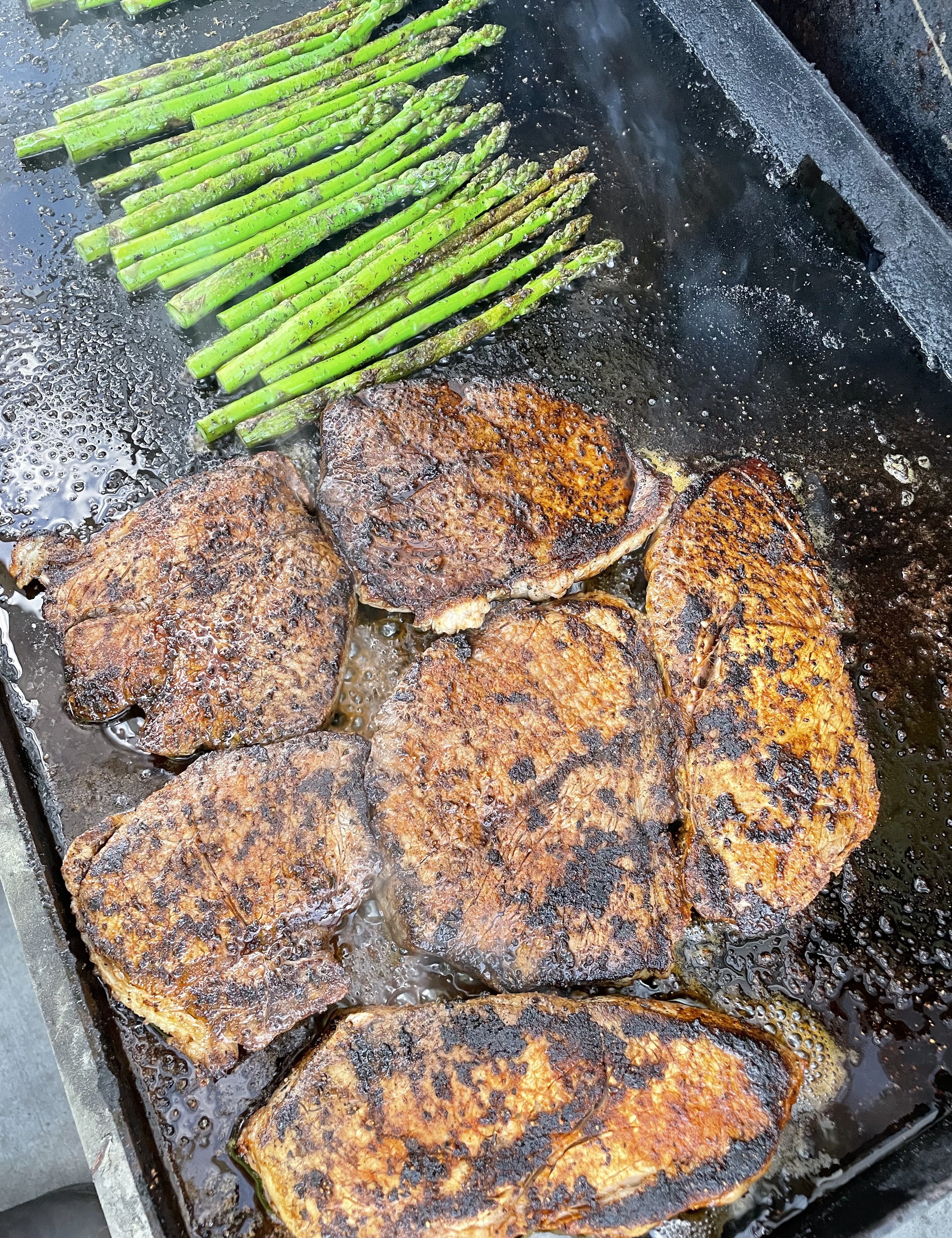 Steak and Asparagus on the blackstone